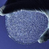 A slice of ice core from Berkner Island, depth 120m. Trapped air bubbles - an archive of the past atmosphere - are visible in the ice.