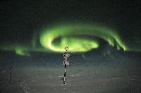 Aurora above the signpost at Halley Research Station